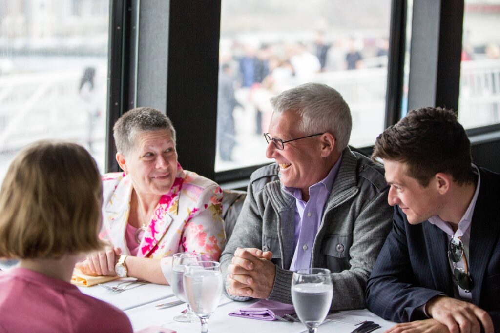 Older gentleman celebrating retirement party onboard City Cruises in New Jersey